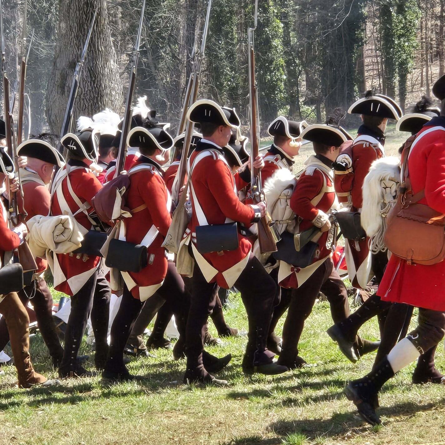 Reenactors impersonate British redcoats in the Battle of Guilford Courthouse