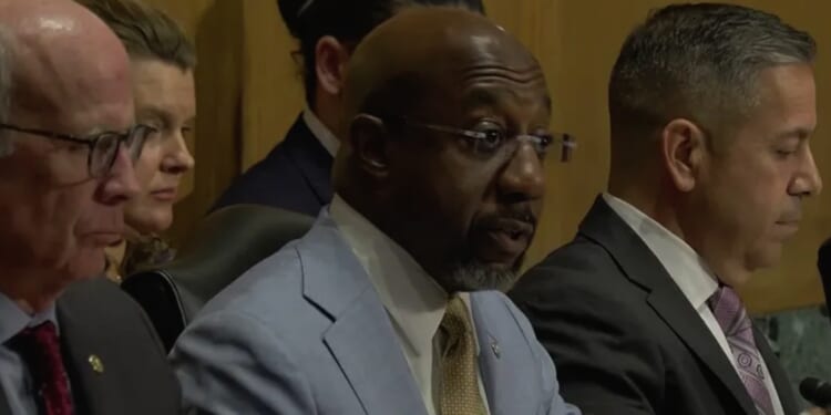 Warnock fans flames with over-the-top SCOTUS rhetoric